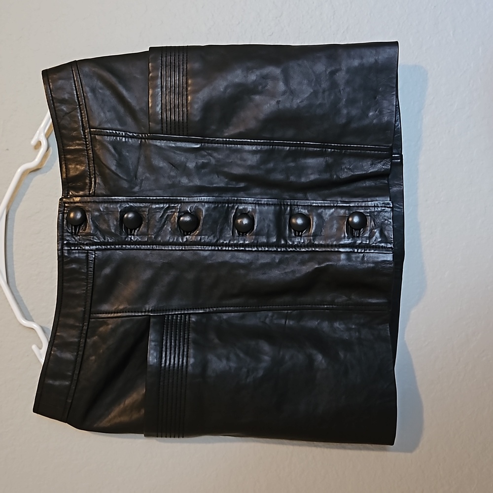 Sezane black leather mini skirt.